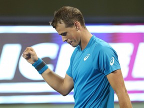Vasek Pospisil of Canada celebrates a point during the match against Ivo Karlovic of Croatia on Day 2 of the ATP Shanghai Rolex Masters 2016 at Qi Zhong Tennis Centre on October 10, 2016 in Shanghai, China.