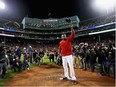 David Ortiz of the Boston Red Sox tips his cap after the Cleveland Indians defeated the Boston Red Sox 4-3 in Game 3 of the American League Divison Series to advance to the American League Championship Series at Fenway Park on Monday in Boston.