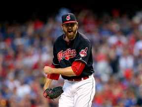 Andrew Miller of the Cleveland Indians celebrates after striking out Josh Donaldson during game two of the American League Championship Series. A court will consider an injunction that would prevent Cleveland players from wearing their regular jerseys when they play in Toronto this week.