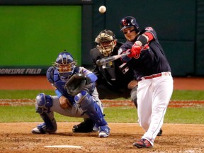 Roberto Perez of the Indians hits a three-run homer during the eighth inning against the Chicago Cubs in Game 1 of the World Series at Progressive Field in Cleveland on Tuesday night.