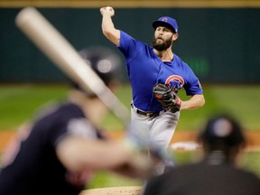 Jake Arrieta of the Chicago Cubs throws a pitch during the first inning against the Indians in Game 2 of the World Series at Progressive Field  in Cleveland on Wednesday night.