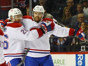 Montreal Canadiens defencemen Shea Weber (right) and Jeff Petry celebrate a goal against the New York Islanders on Oct. 26.