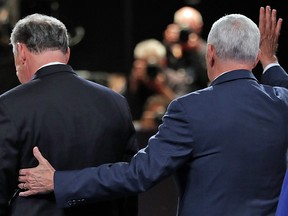The vice presidential debate, by contrast, had this half hug.