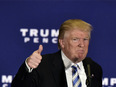 Republican presidential nominee Donald Trump gives the thumbs-up after speaking at a campaign event at the Eisenhower Hotel in Gettysburg, Pennsylvania on October 22, 2016.