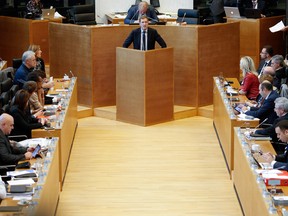 Members of the Wallon parliament listen as Minister-President Paul Magnette speaks during a debate on the EU-Canada Comprehensive Economic and Trade Agreement on October 28, 2016.