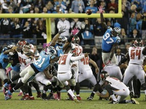 Tampa Bay Buccaneers' Roberto Aguayo kicks the game-winning field goal against the Carolina Panthers in the final seconds of game in Charlotte, N.C., on Monday night.