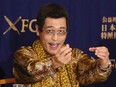 Japanese singer song writer Pikotaro, as he is known, answers a qurstion at a press conference in Tokyo, Friday, Oct. 28, 2016.