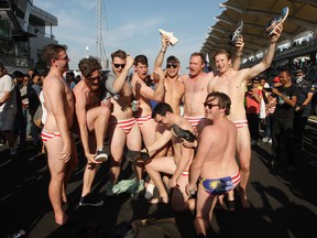 The nine were detained since Sunday after they partied in their swimwear and drank beer from shoes in full view of thousands of spectators at the Sepang track after Australian driver Daniel Ricciardo won the race.