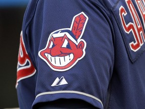 In this April 8, 2014 photo, the Cleveland Indians' Chief Wahoo logo is shown on a uniform sleeve.
