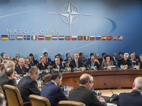 NATO defense ministers are seated during a meeting of the North Atlantic Council Defense Ministers session at NATO headquarters in Brussels Thursday, Oct. 27, 2016.