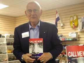 Fred van Zuiden with the book he wrote about his experiences