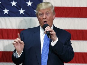 Republican presidential candidate Donald Trump speaks during a town hall in Sandown, N.H.