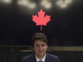 Prime Minister Justin Trudeau delivers opening remarks as he meets with members of the China Entrepreneur Club at Willson House in Chelsea, Que., on Oct. 18.