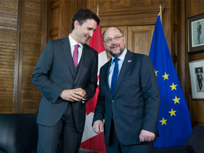Prime Minister Justin Trudeau, left, speaks with European Parliament President Martin Schulz at the start of a meeting on Parliament Hill in Ottawa on Wednesday, May 18, 2016.
