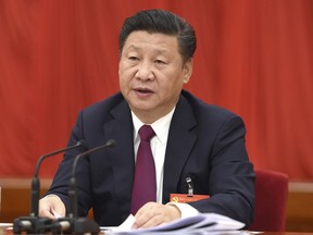 In this photo released by Xinhua News Agency, Chinese President Xi Jinping, also general secretary of the Communist Party of China (CPC) Central Committee, speaks at the Sixth Plenary Session of the 18th CPC Central Committee, in Beijing on Thursday, Oct 27, 2016. China's Communist Party has elevated President Xi Jinping to the position of "core" of the leadership, underscoring the overwhelming clout he has amassed on the back of a sweeping anti-corruption campaign and crackdown on dissent. (Li Xueren/Xinhua via AP)