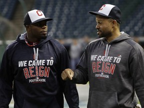 Cleveland Indians outfielders Rajai Davis, left, and Coco Crisp wear their "We Came To Reign" sweatshirts at Thursday's workout at Progressive Field before the American League Championship Series against the Toronto Blue Jays.