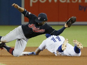 Kevin Pillar of the Toronto Blue Jays slides into second base ahead of the tag by Cleveland Indians' shortstop Francisco Lindor during Game 3 action in the ALCS Monday night at Rogers Centre. Despite Pillar's effort here, the Jays lost 4-2 to fall behind 3-0 in the series. Game 4 is Tuesday in Toronto.