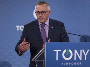 Conservative MP Tony Clement addresses supporters as he holds a rally in Mississauga, Ontario to announce his candidacy for the leadership of the Federal Conservative Party on Tuesday, July 12, 2016.