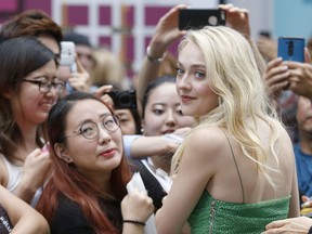 Actress Dakota Fanning arrives at the premiere of American Pastoral during the Toronto International Film Festival on Sept. 9, 2016.