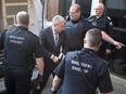 Dennis Oland arrives for a bail hearing in Fredericton on Tuesday, Oct. 25, 2016.