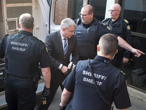 Dennis Oland arrives for a bail hearing in Fredericton on Tuesday, Oct. 25, 2016.