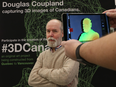 Douglas Coupland, Canadian novelist, artist and self-proclaimed futurist, poses for a photo at Simons at the Rideau Centre in Ottawa Friday Oct. 28, 2016.