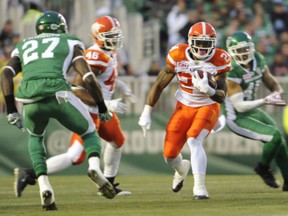 B.C. Lions running back Jeremiah Johnson  moves the ball up field against the Saskatchewan Roughriders during game in Regina on Saturday.