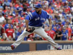 Toronto Blue Jays pitcher Francisco Liriano throws in a relief appearance against the Texas Rangers on Oct. 7.