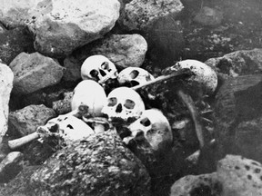 A 1945 photo of skulls, bleached white by the sun, discovered around King William Island in what is now Nunavut.