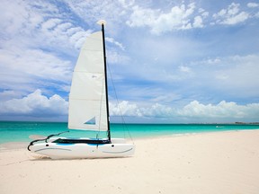 Providenciales is home to Grace Bay Beach, a long stretch of powder-soft sand and clear turquoise waters protected by an offshore coral reef.