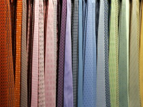 Silk ties hang on display during the inaugural opening for the new Hermès store on Wall Street in New York in a 2007 file photo.