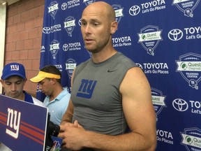 In this Aug. 18 file photo, New York Giants kicker Josh Brown speaks with reporters at training camp in East Rutherford, N.J. The Giants released Brown on Oct. 25.