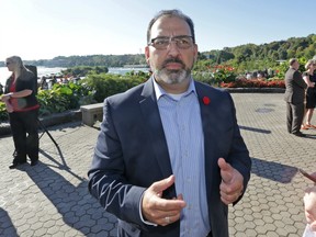 Energy Minister Glenn Thibeault, shown in Niagara Falls recently, says a 'robust and effective promotions campaign' has used up almost all the money for the hydro rebates.