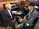 Tragically Hip frontman Gord Downie news anchor Peter Mansbridge speaks with in Toronto on Tuesday Oct. 11, 2016.