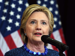 Hillary Clinton answers a question during a press conference about the FBI's reopening of a probe into her use of a private email server while secretary of State, in Des Moines, Iowa, on Oct. 28, 2016.