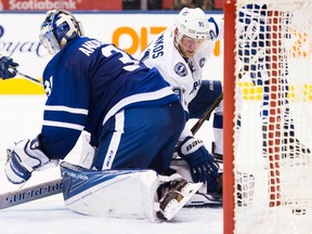 Tampa Bay's Steven Stamkos (right) scores on Toronto goaltender Frederik Andersen on Oct. 25.