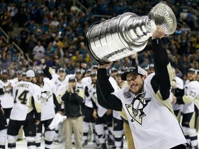 Pittsburgh Penguins captain Sidney Crosby skates with the Stanley Cup on June 12.