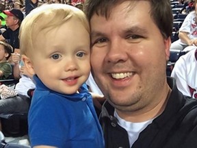 A file photo of Justin Ross Harris and his son Cooper before Harris left the 22-month-old to die in his overheated SUV