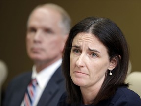 Katie McLaughlin, former wife of former Subway pitchman Jared Fogle, makes a statement on legal action filed on her behalf as attorney Mike Antrim looks on during a press conference in Noblesville, Ind., Monday, Oct. 24, 2016.