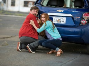 Zach Galifianakis and Isla FIsher in Keeping Up With The Joneses