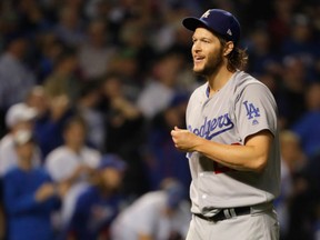 Los Angeles Dodgers pitcher Clayton Kershaw reacts after getting the final out against the Chicago Cubs in Game 2 of the NLCS on Oct. 16, 2016.