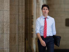 Prime Minister Justin Trudeau makes his way to caucus on Parliament Hill in Ottawa on Oct. 26.