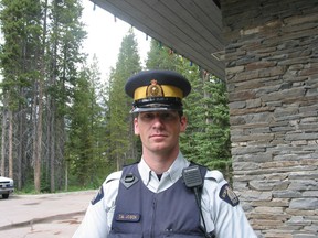 Trevor Josok stands outside the Lake Louise detachment