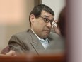 In this Oct. 25, 2016 photo, Anthony Garcia adjusts his glasses during closing arguments in his trial