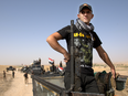 Iraqi special forces soldiers deployed for an offensive to retake Mosul from ISIL militants prepare to move out from a camp near Khazer, Iraq, on Friday, Oct. 14, 2016.