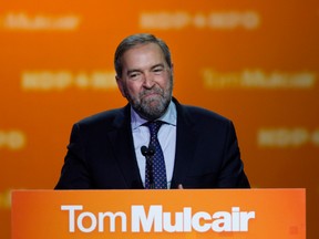 NDP leader Tom Mulcair delivers a speech to party supporters in Montreal on Oct. 19, 2015.