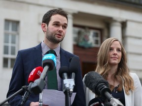 Daniel and Amy McArthur of Ashers Baking Company speak to the media at Belfast High Court, Northern Ireland, as judgment is due to be delivered on an appeal brought by the Christian bakers who were found to have discriminated against gay man Gareth Lee, Monday, Oct. 24, 2016.
