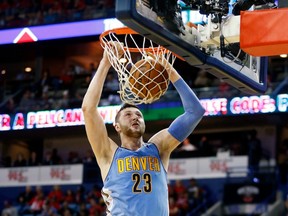 Denver Nuggets centre Jusuf Nurkic dunks against the New Orleans Pelicans on Oct. 26.