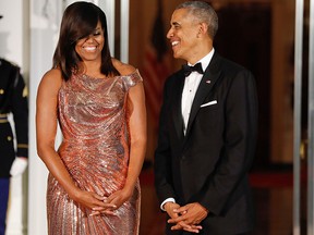 Michelle Obama chose Italian label Atelier Versace for the White House dinner honouring Italian Prime Minister Matteo Renzi and his wife, Agnese Landini.