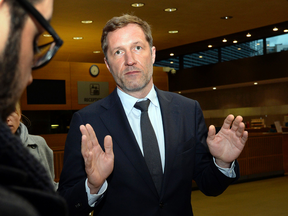 Wallonia’s Prime Minister Paul Magnette talks to reporters after meeting with the European Union Commissioner for Trade in Brussels, Oct. 19, 2016.